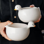 Bol à œufs en forme de canard en céramique, un ustensile de cuisine conçu pour l'agitation et la collecte d'œufs qui coule l'atelier des ustensiles